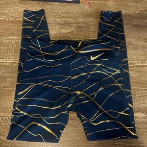 Nike Women's Navy and Gold Patterned Leggings